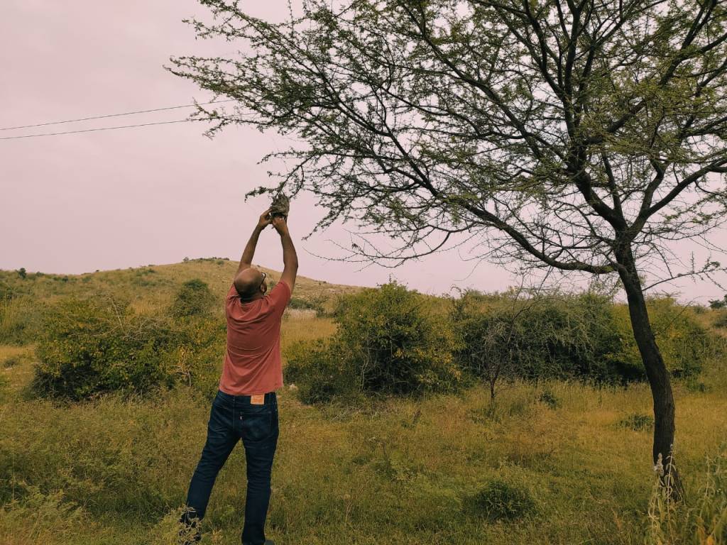 alt = "Bharat doing field work"